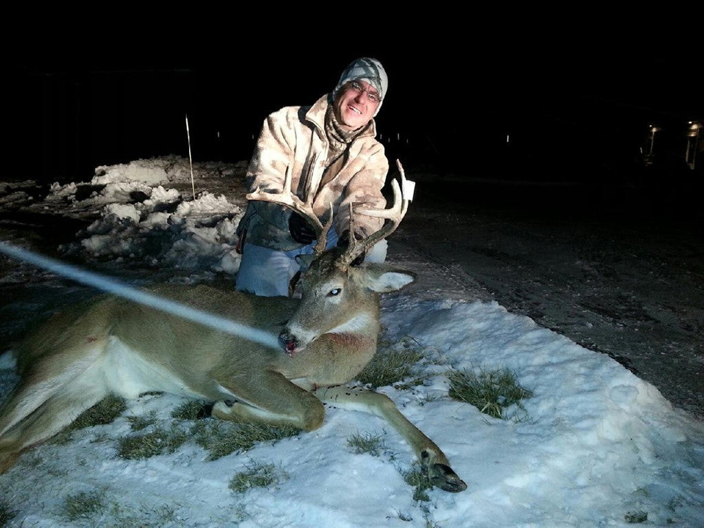 a buck with a good rack, taken down by a muzzeloader