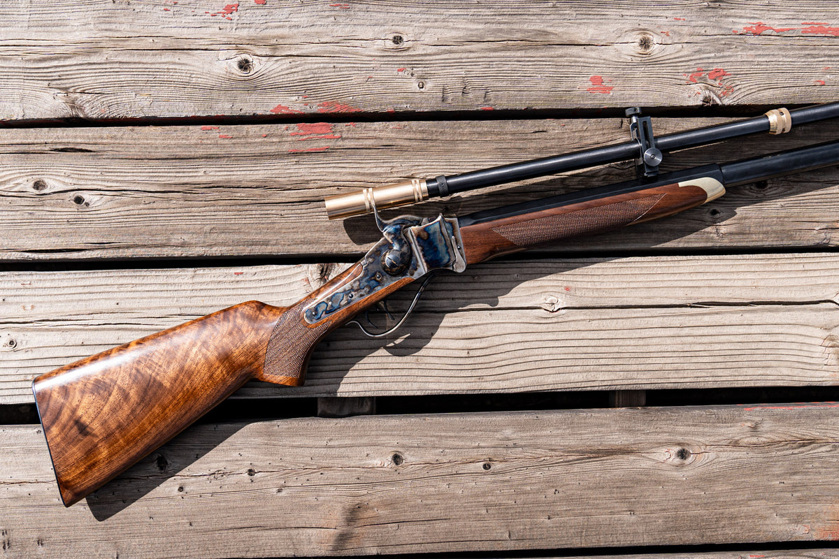 6X Long Malcolm Gen II scope mounted on an 1874 Sharps rifle