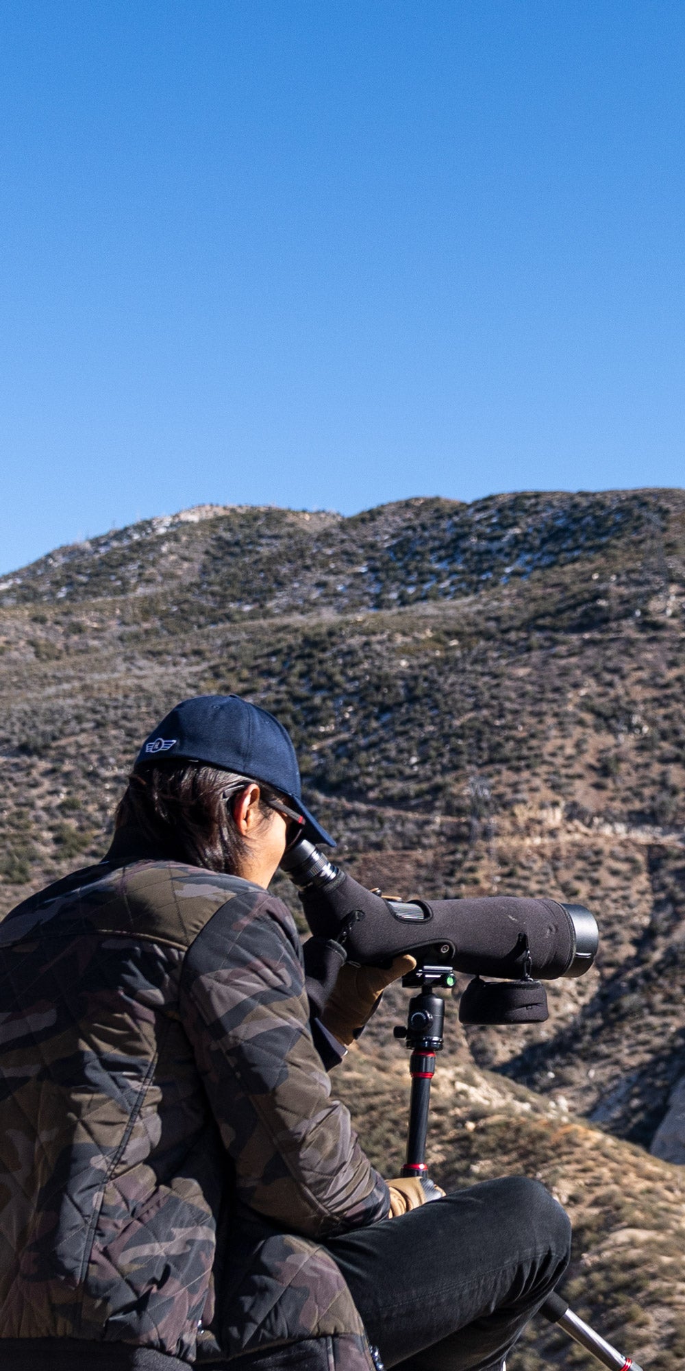 Phenom UHD Spotting Scope looking out over a mountain vista