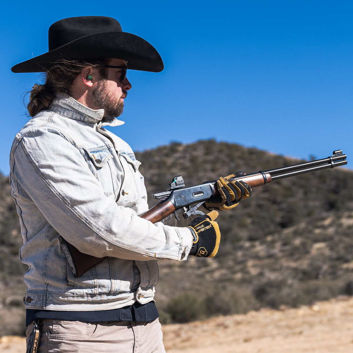 A TD-3 red dot sight mounted on a Winchester 94 lever action in .30-30