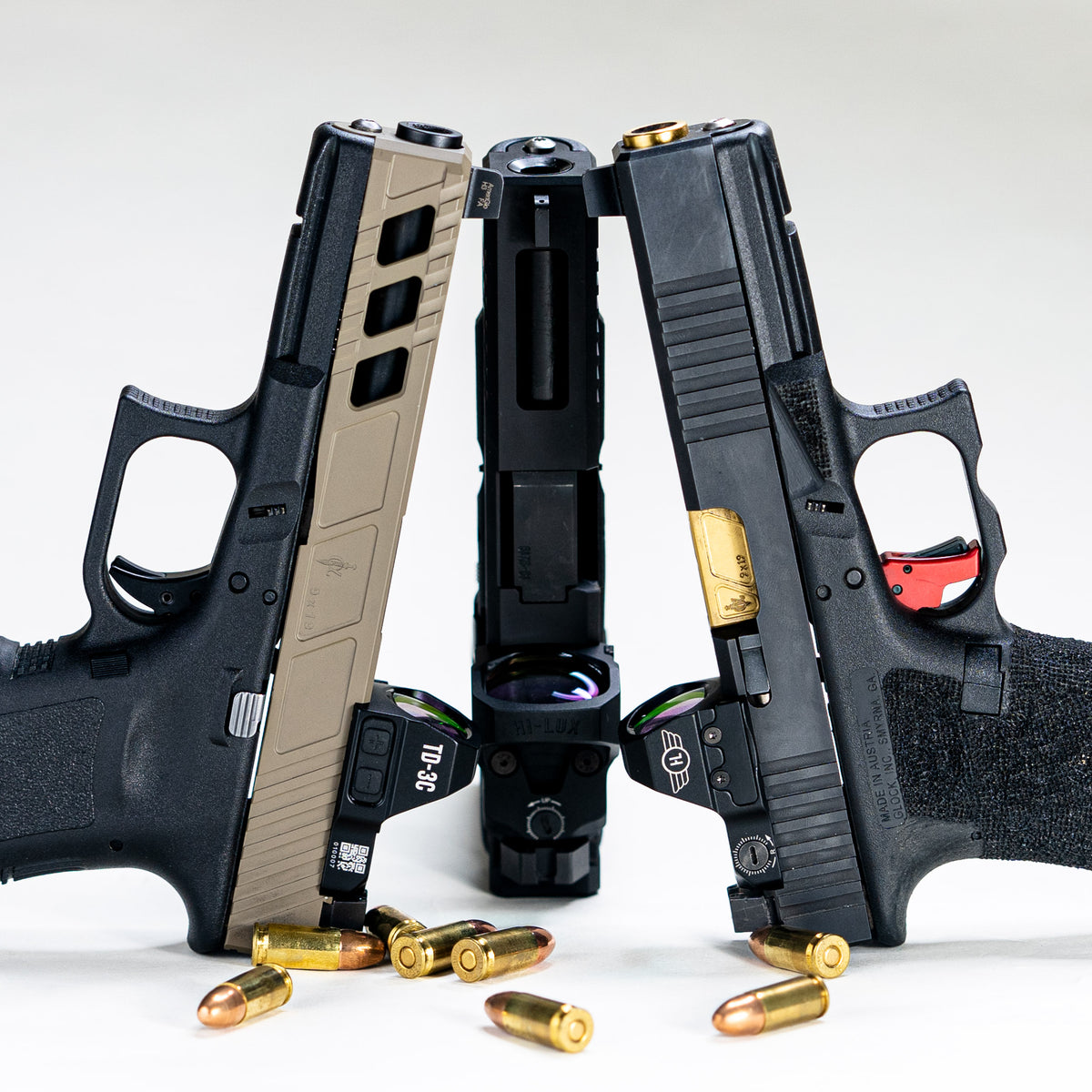 TD-3C red dot sights mounted on a mix of Glocks